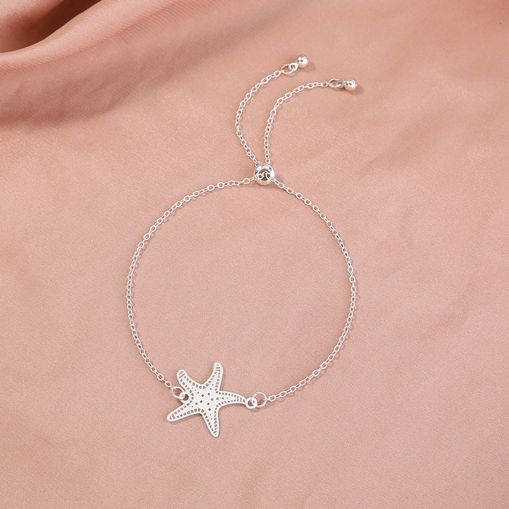 Silver starfish, glow-in-the-dark shrink bracelet