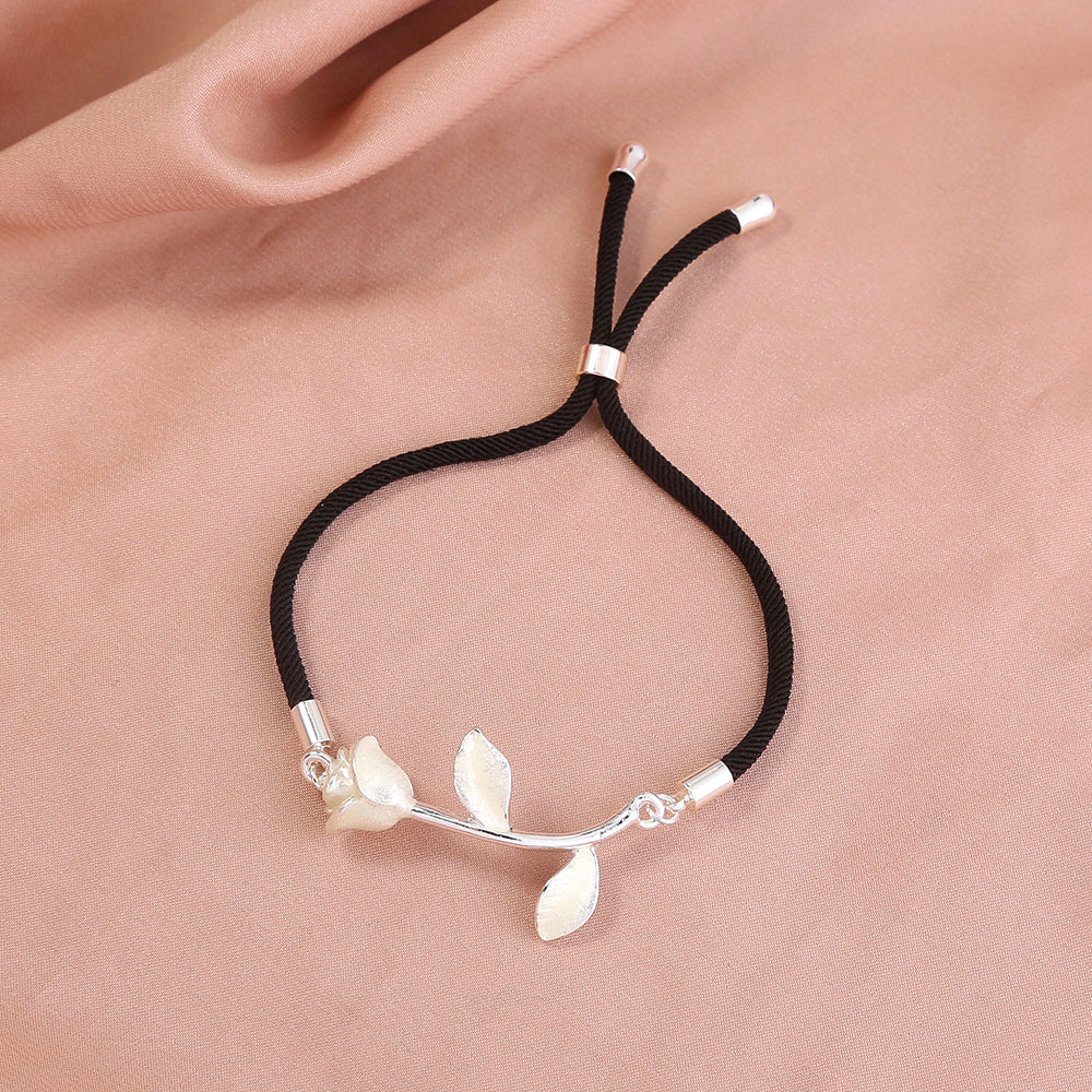 Glow-in-the-dark silver rose leather cord adjustment shrink bracelet