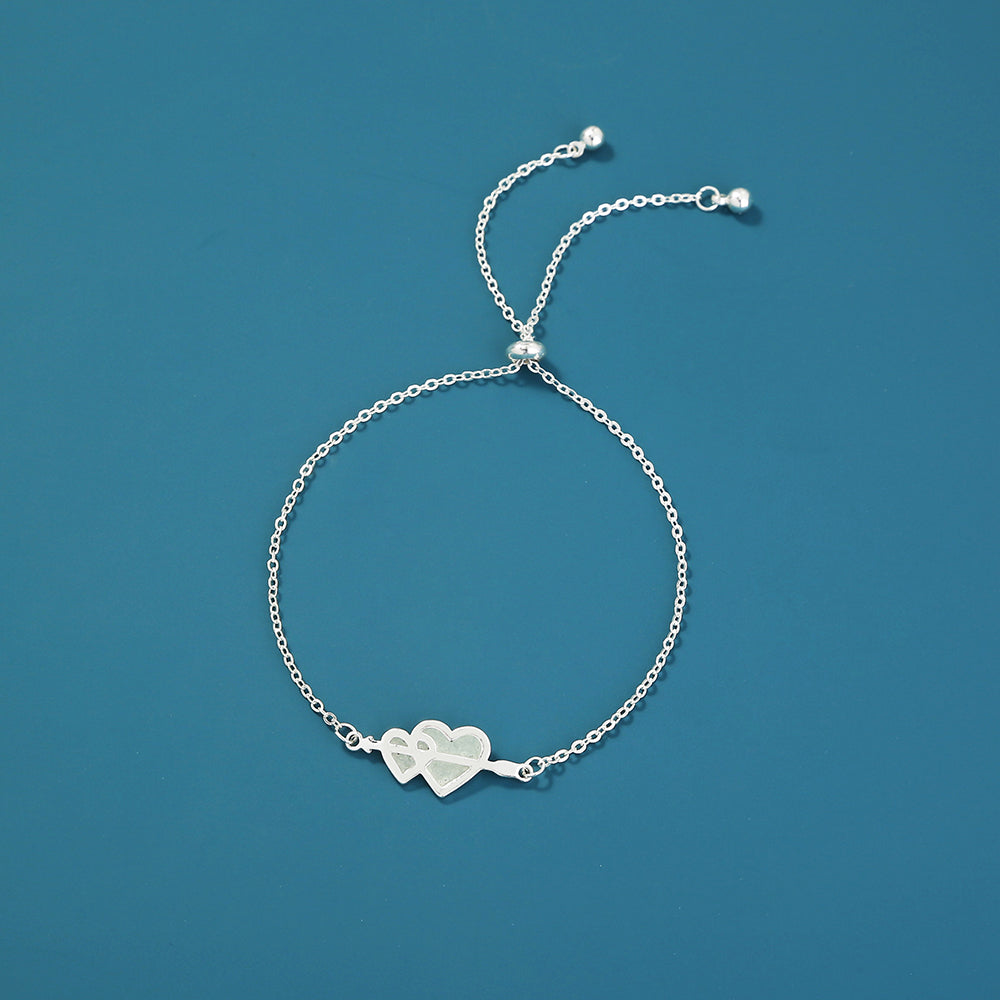 Glow-in-the-dark couple love heart silver bracelet