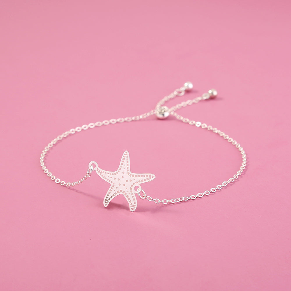 Silver starfish, glow-in-the-dark shrink bracelet