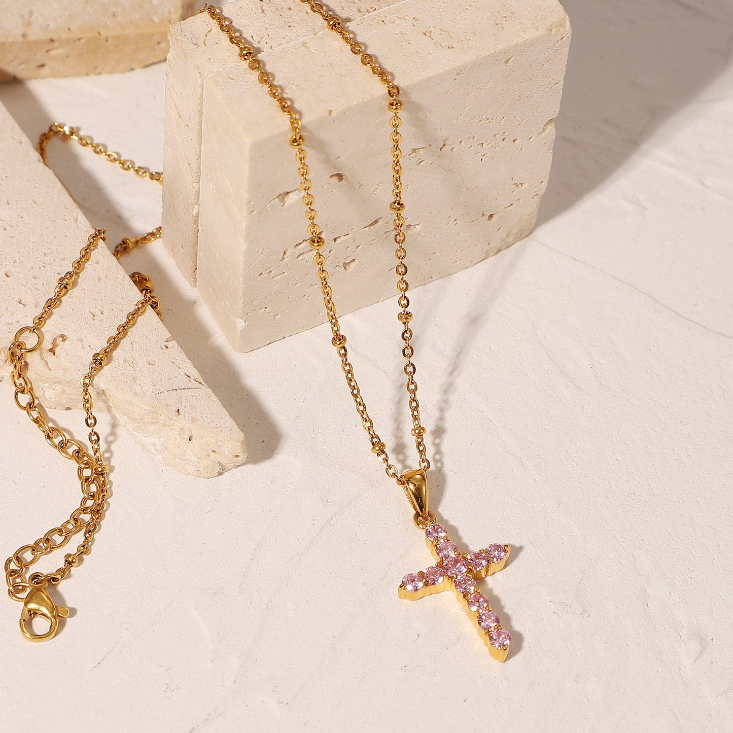 N39.18K Gold Plated Pink Zircon Cross Pendant Necklace